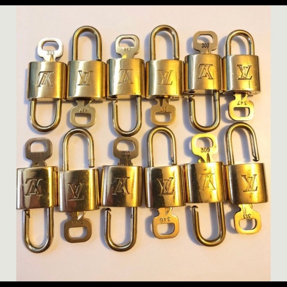 Louis Vuitton Accessories - 2 Louis Vuitton lock and key sets Louis Vuitton Accessories - 2 Louis Vuitton lock and key sets